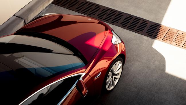 Musk says too much automation was a mistake as Tesla Model 3 halts production again.