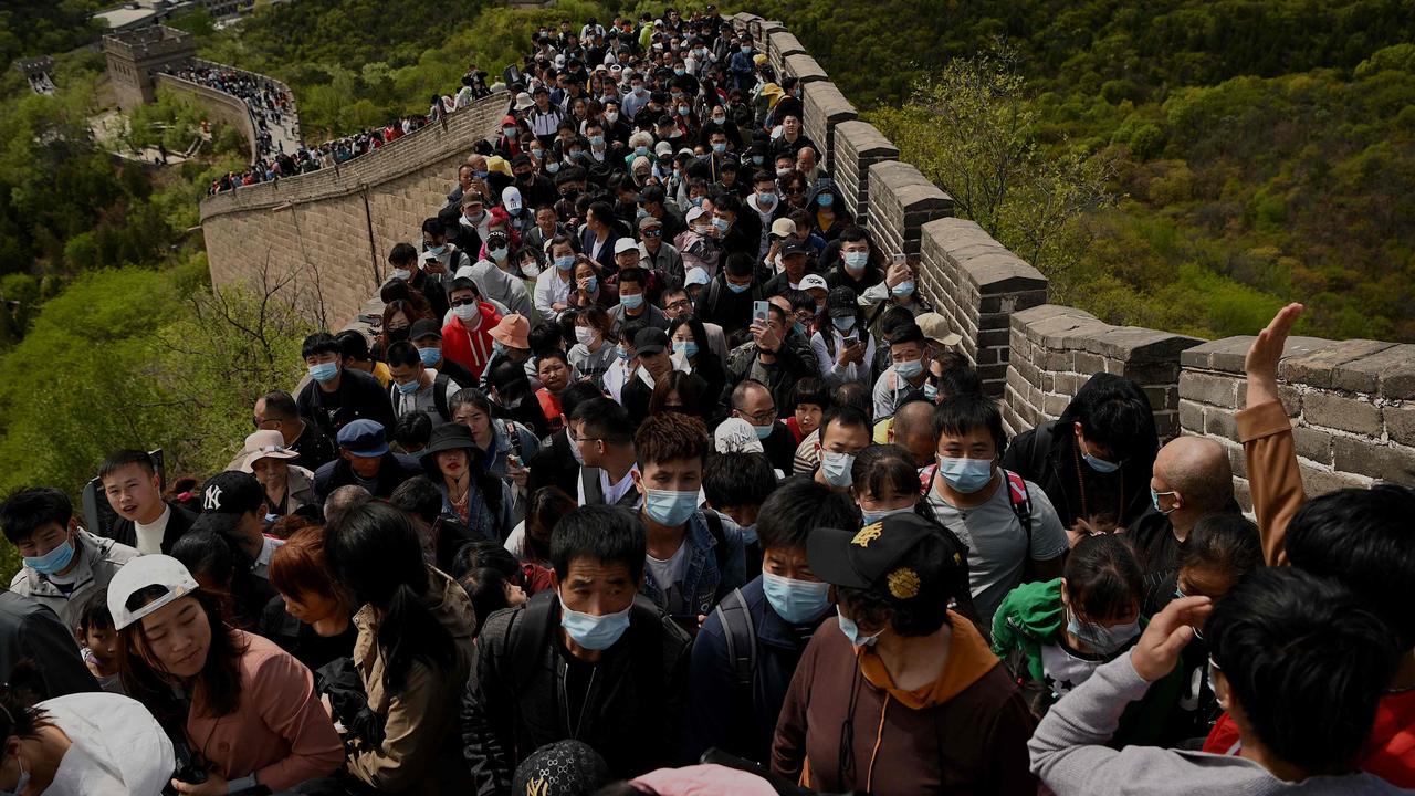 While a few wore masks, social distancing wasn’t followed. Picture: Noel Celis/AFP