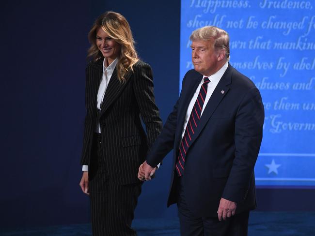 US President Donald Trump and First Lady Melania Trump held hands after the debate. Picture: Saul Loeb/AFP