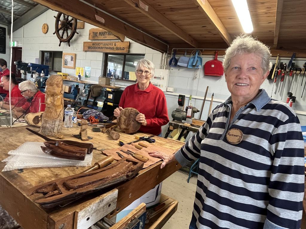 Rosemary Anderson and Sue Smith enjoying some woodworking at the exhibition at the Fraser Coast Show.