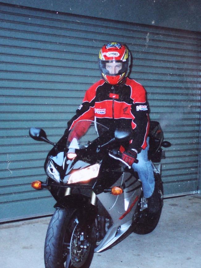 Shane Powell was fatally struck by a stolen vehicle while riding his motorbike.