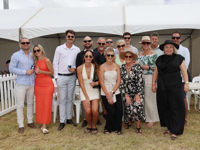 Kylie, Warren, Taylor, Troy, Debbie, Ryan, Chris, Danielle, James, Emma, Michelle, Harry, Taylah, Mark and Amy at the Pakenham Cup. Picture: Brendan Beckett