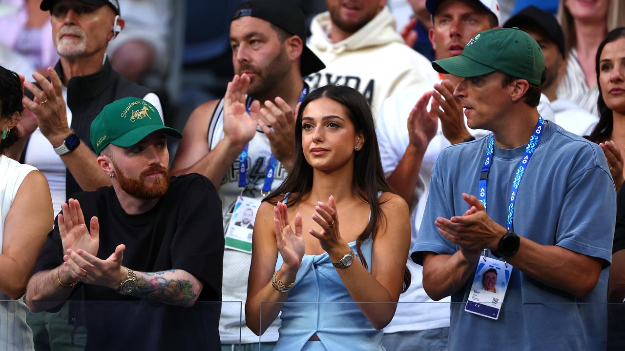 Costeen Hatzi, girlfriend of Nick Kyrgios, Daniel Horsfall, manager of Nick Kyrgios and Elliot Loney are seen in the Men's Singles First Round match against Jacob Fearnley of Great Britain during day two of the 2025 Australian Open at Melbourne Park on January 13, 2025 in Melbourne, Australia. (Photo by Graham Denholm/Getty Images)