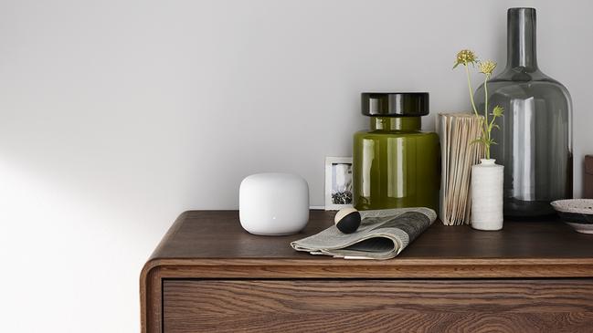 Google's Nest Wi-Fi mesh system doubles as a smart speaker and a night light.,