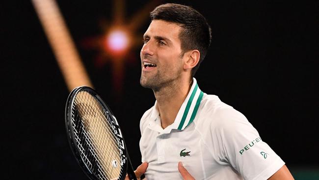 Novak Djokovic celebrates victory over Aslan Karatsev. Picture: AFP