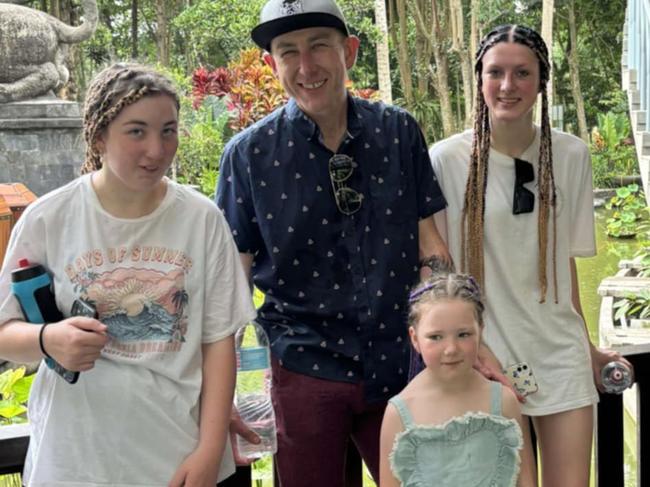 Aldi store manager Aaron Nordbye of Melbourne, his partner Hariet and daughters Emily, 16, Ava, 14, and Audrey, 5, are stranded in Bali due to the volcano.