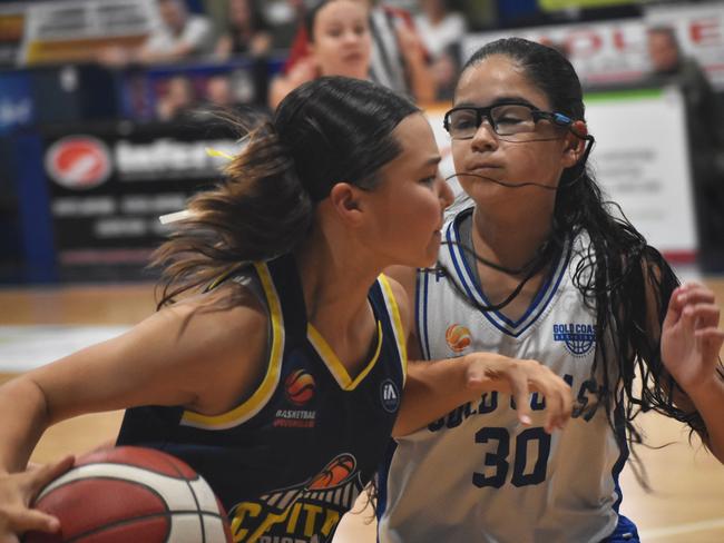 Action at the Basketball Queensland under-14 girls state championships at Bravus Arena in Rockhampton on July 1, 2024.