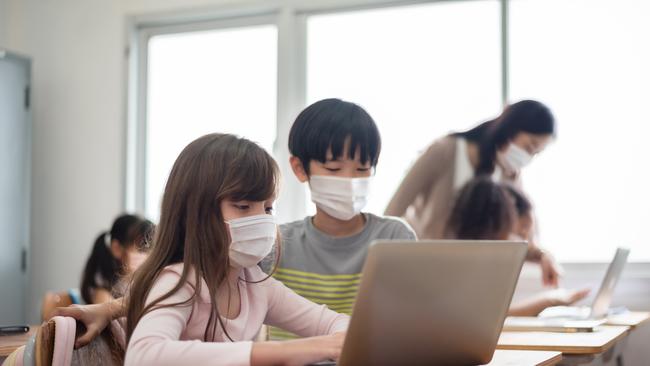 Students won't be required to wear face masks at schools despite climbing Covid and flu cases.