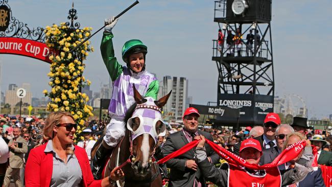 Jockey Michelle Payne celebrates after winning the 2015 Melbourne Cup on Prince of Penzance at Flemington.