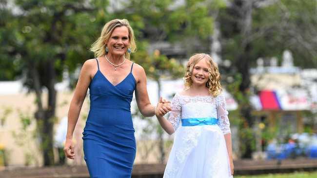 Annika Dean, here with mother Kylie, is a finalist for Queensland's Community Achievement awards. Picture: Troy Jegers