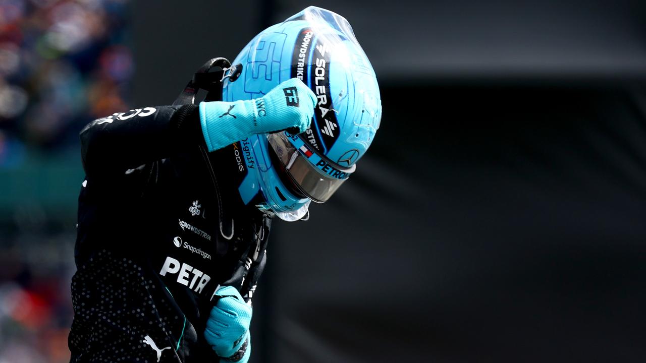 NORTHAMPTON, ENGLAND – JULY 06: Pole position qualifier George Russell of Great Britain and Mercedes celebrates in parc ferme during qualifying ahead of the F1 Grand Prix of Great Britain at Silverstone Circuit on July 06, 2024 in Northampton, England. (Photo by Mark Thompson/Getty Images)