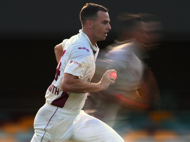 BRISBANE, AUSTRALIA - NOVEMBER 24: (EDITORS NOTE: Multiple exposures were combined in camera to produce this image.) Jack Wildermuth of Queensland bolws during the Sheffield Shield match between Queensland and Victoria at The Gabba, on November 24, 2024, in Brisbane, Australia. (Photo by Matt Roberts/Getty Images)