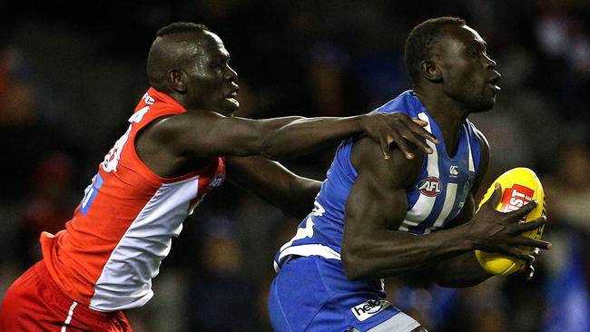 Aliir Aliir and Majak Daw going head-to-head in Round 17. Picture: AAP