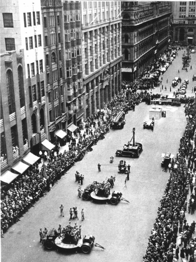 The National Emergency Service demonstrates Air Raid precautions in Martin Place, Sydney in 1942 (in foreground anti-aircraft guns, behind them the sound locators &amp; searchlight units. Picture: State Library of NSW.