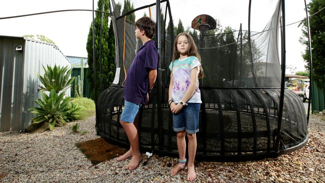 Zoe, 10, and brother Daniel, 12, often played on the trampoline where the powerline fell on. Picture: Jonathan Ng