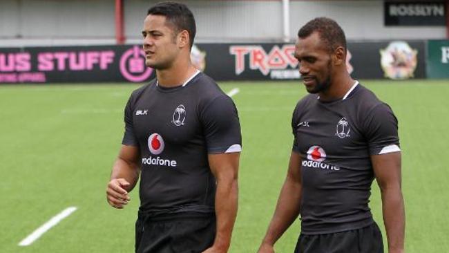 Jarryd Hayne with teammate Osea Kolinisau at training. Picture: Martin Seras Lima