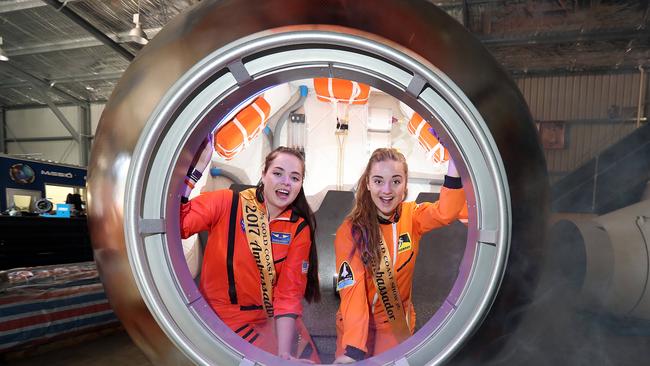 Tani Stubbs and Savannah Tindiglia with Gilmour Space Technologies space pods. Photo by Richard Gosling