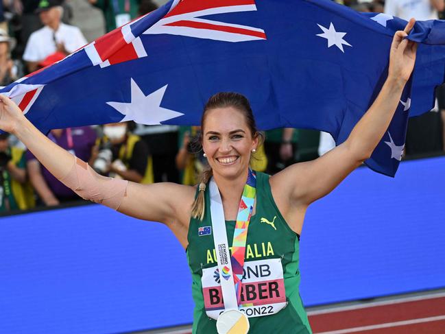 Australia's Kelsey-Lee Barber celebrates with her medal after winning the women's javelin throw final during the World Athletics Championships at Hayward Field in Eugene, Oregon on July 22, 2022. (Photo by ANDREJ ISAKOVIC / AFP)