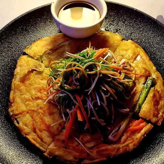 This is a vegetable pancake served at Signature and yes, it tastes like magic. Picture: Danica Clayton