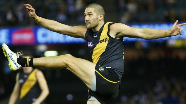 AFL Round 23 - Nth Melbourne vs Richmond at Etihad Stadium , Shaun Grigg in action. Melbourne. 4th August 2015. Picture: Colleen Petch.