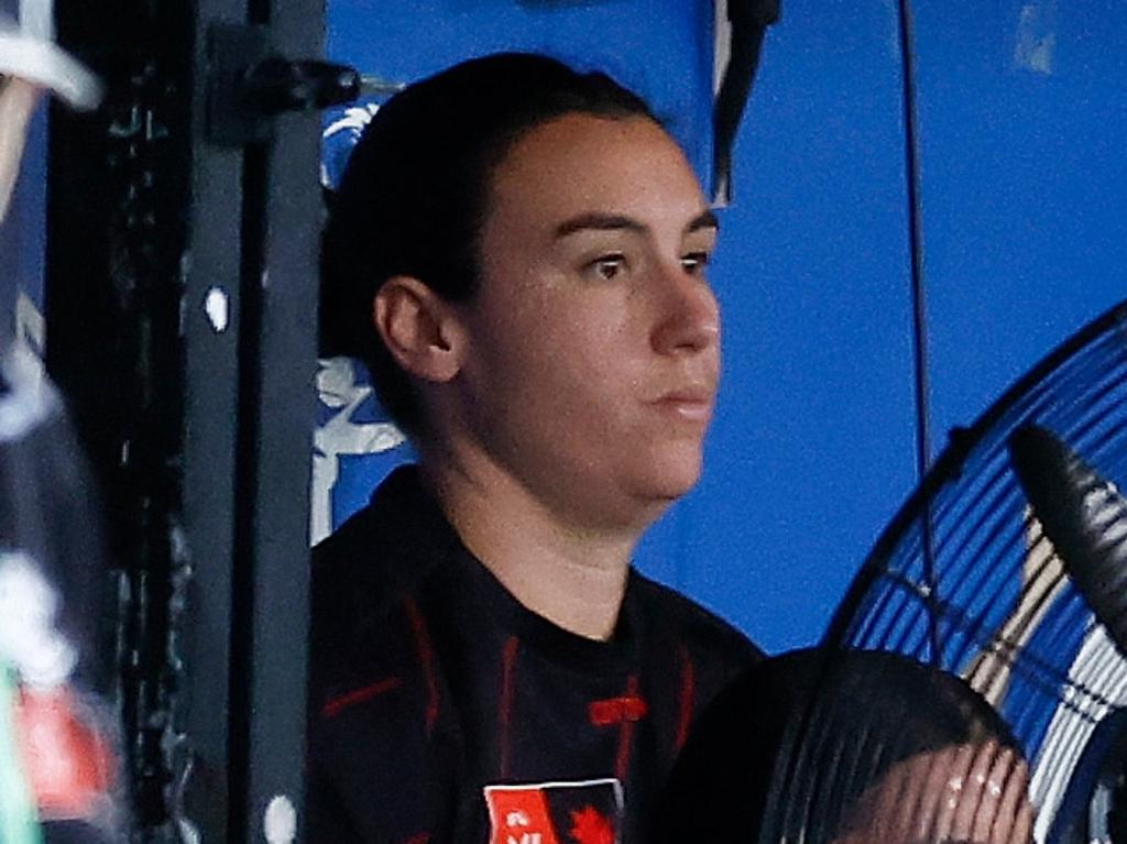 Bonnie Toodgood watches on from the sidelines after being injured.