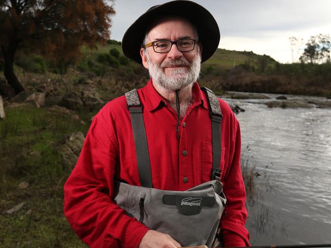 For TasWeekend. Trout fisherman Greg French in the Jordan River. Greg French has written a book The Last Wild Trout. Picture: NIKKI DAVIS-JONES