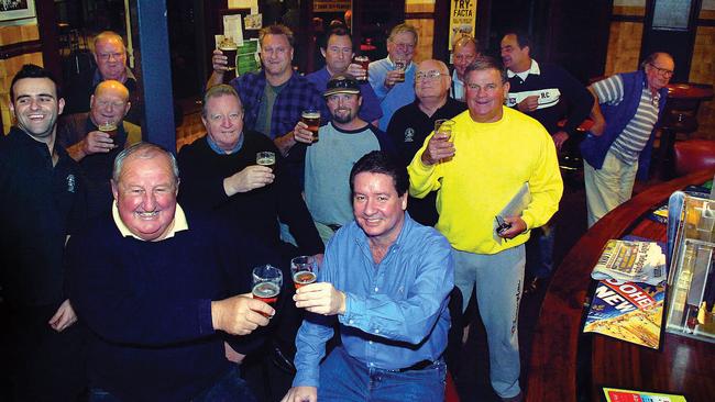 Ross Ryan (centre) has a drink with loyal patrons at Manly’s Hotel Steyne just days before he handed over the keys to its new owners in August 2006. It was reported tat the beachside pub sold for $50m. Picture: Virginia Young