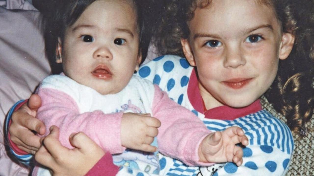 Kari-Lee with her adopted baby sister Tiana in 1995.