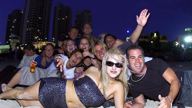 Sarah and Paul Smith see the first sunrise on Surfers Paradise beach