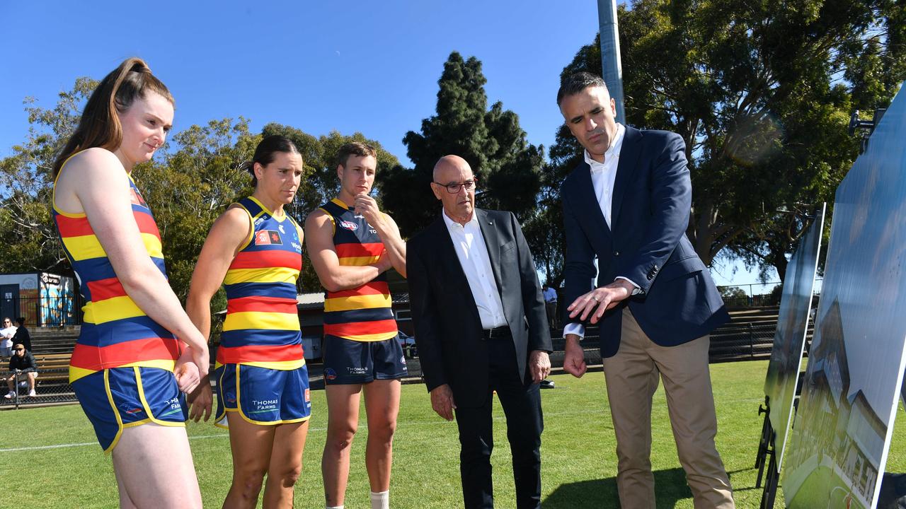 Crows players Sarah Allan, Chelsea Randall and Jordan Dawson with John Olsen and Premier Peter Malinauskas. Picture: Keryn Stevens