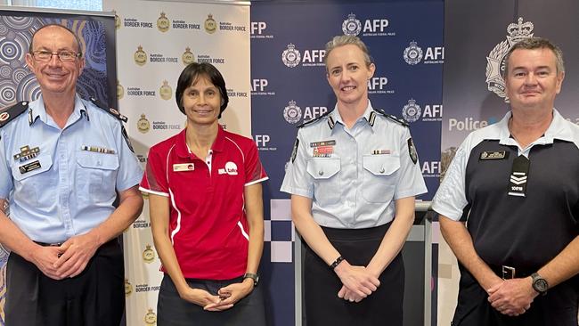 Assistant Commissioner Brett Schafferius, Leanne Bell TAFE Queensland Faculty Manager Aboriginal and Torres Strait Island and the Arts, Australian Federal Police Commander Caroline Taylor, and Australian Federal Police Senior Constable and program mentor Brian McAloman. Picture: Isaac McCarthy