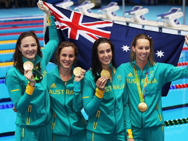 Australia's Cate Campbell, Bronte Campbell, Brittany Elmslie, Emma McKeon Gold Medal winning 4 x 100m relay team on Day 1 of the Swimming at the Rio 2016 Olympic Games. Picture. Phil Hillyard