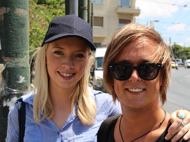 Will be OK ... Australian tourists Emma Yandle, 23 and Danny Lent, 21, in Athens, both hairdressers from Perth, have enough cash to finish their trip. Picture: Charles Miranda