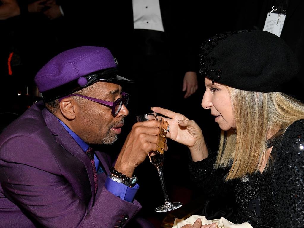 Spike Lee and Barbra Streisand get deep over a glass of champers. Picture: Getty Images