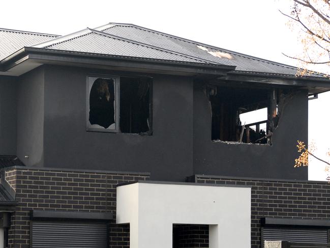 The top windows were blown out by the blaze. Picture: Andrew Henshaw