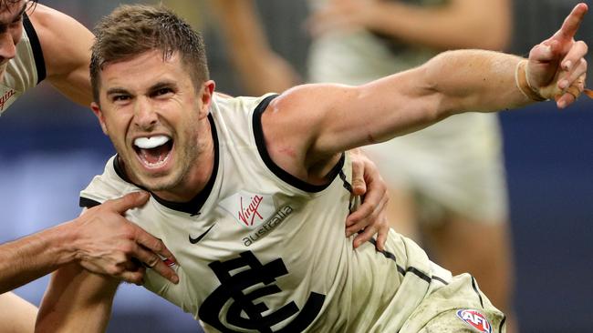 Marc Murphy (right) of the Blues celebrates after kicking a goal during the Round 15 AFL match between the Fremantle Dockers and the Carlton Blues at Optus Stadium in Perth, Sunday, June 30, 2019. (AAP Image/Richard Wainwright) NO ARCHIVING, EDITORIAL USE ONLY