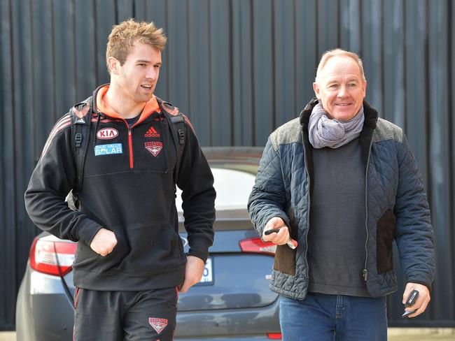 Then-Essendon player Stewart Crameri chats to Danny Corcoran at Windy Hill in 2013. Picture: Nicole Garmston