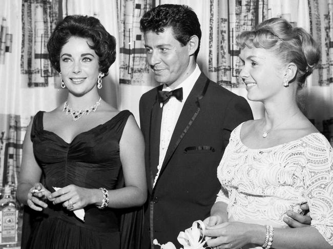 June 19,1958. Elizabeth Taylor, Eddie Fisher, and Debbie Reynolds are at the opening of Eddie Fisher’s show at the Tropicana in Las Vegas. Picture: AP Photo/Las Vegas News Bureau