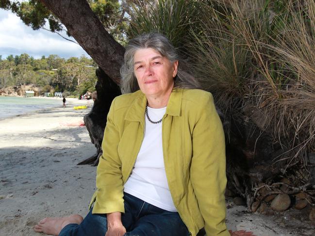 Kingborough councillor Flora Fox examines erosion at Coningham Beach.