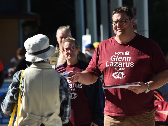 Queensland independent Senate candidate Glenn Lazarus hands out How-to-vote cards outside a polling booth at Jindalee State School in Brisbane on Saturday. Picture: Dan Peled