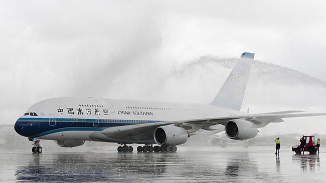 China Southern's new A380 arrives in Sydney, to a water cannon welcome. Picture: Supplied