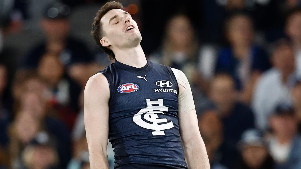 MELBOURNE, AUSTRALIA - AUGUST 25: Blake Acres of the Blues rues a missed shot on goal during the 2024 AFL Round 24 match between the Carlton Blues and the St Kilda Saints at Marvel Stadium on August 25, 2024 in Melbourne, Australia. (Photo by Michael Willson/AFL Photos via Getty Images)