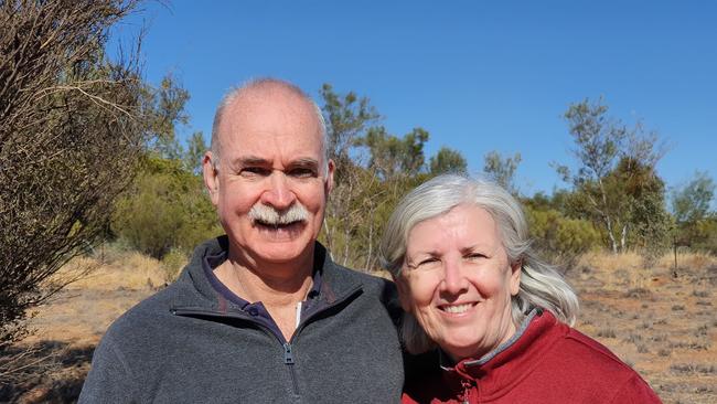 Brisbane couple Donna Ballinger and David Booth are happy find each other safe and sound after a harrowing misadventure on their travels in Central Australia.