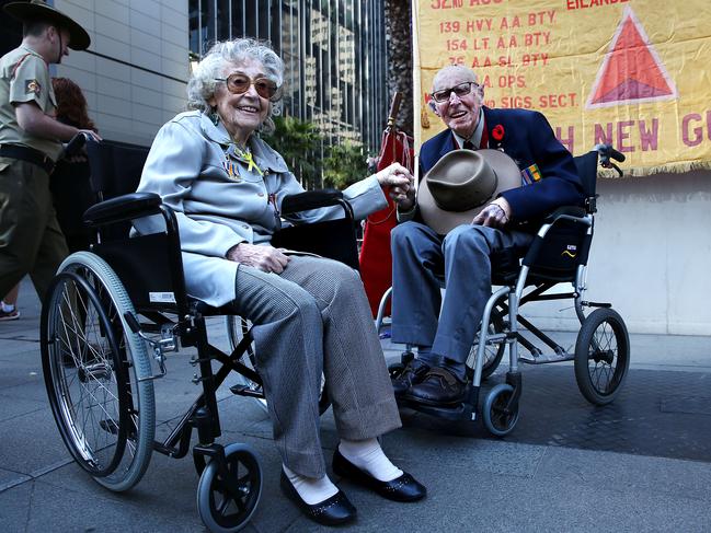 ANZAC Day veterans (L-R) Valerie Ireland, (96), and Albert Maurice Collins (105) share a laugh before marching. Jane Dempster/The Australian.