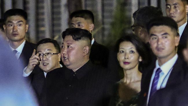 Kim Jong-un is escorted by his security delegation as he visits Marina Bay in Singapore. Picture: AP