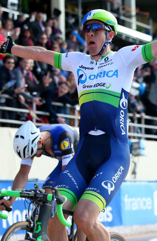 Mathew Hayman crosses the Paris-Roubaix finish line first. (Photo by Bryn Lennon/Getty Images)