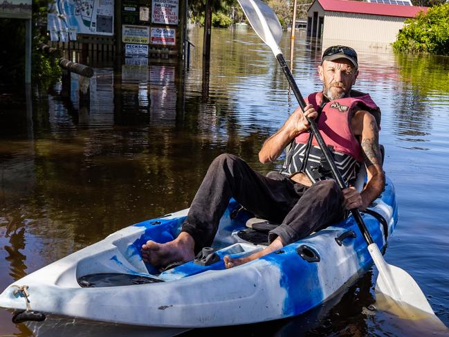 Pete Stripe kayaking along the main street at Swan Reach on December 16th, 2022.Picture: Tom Huntley