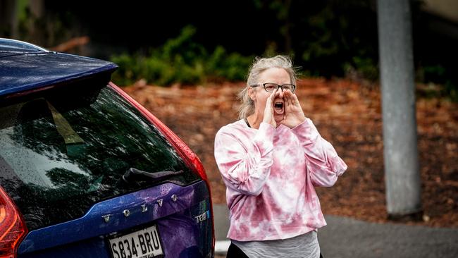 A passerby yells at the protestors from stopped traffic. Picture: Mike Burton