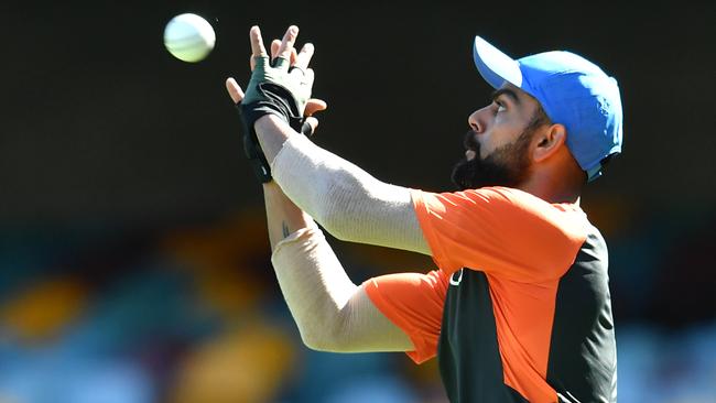 Indian captain Virat Kohli trains at the Gabba on Tuesday. Picture: AAP