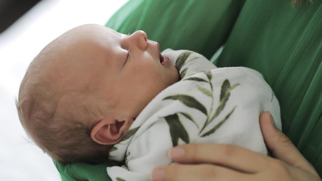 Kendall Gilding with new baby Olive Joy. Pic Mark Cranitch.